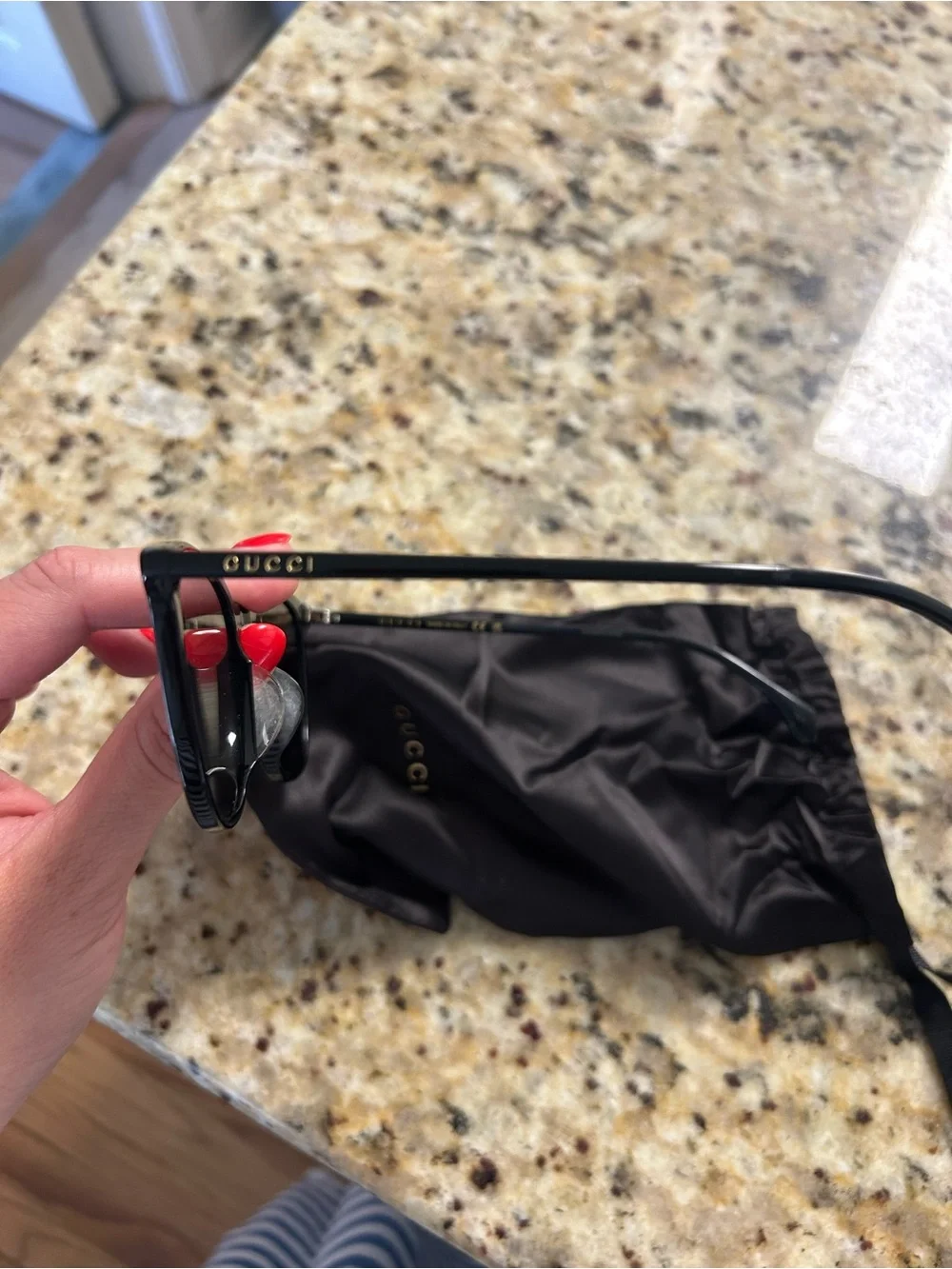 Gucci Men’s Black Frame Sunglasses with Dark Lenses